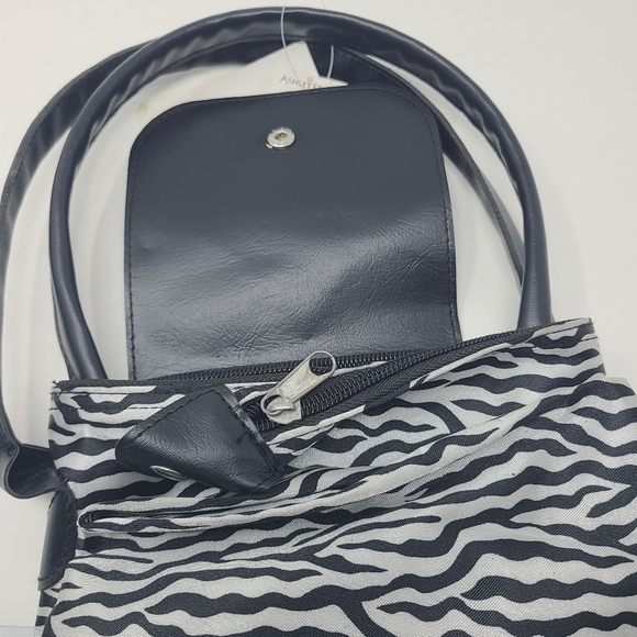 Ashley Stewart | Women's Three-in-One Animal Print Small Handbag to Tote Bag - Picture 4 of 8